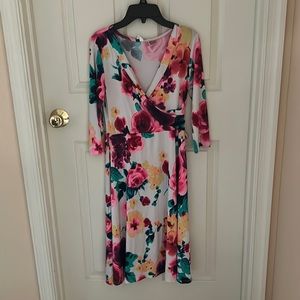 White based with multicolored flower patterns, size Small, Condition good